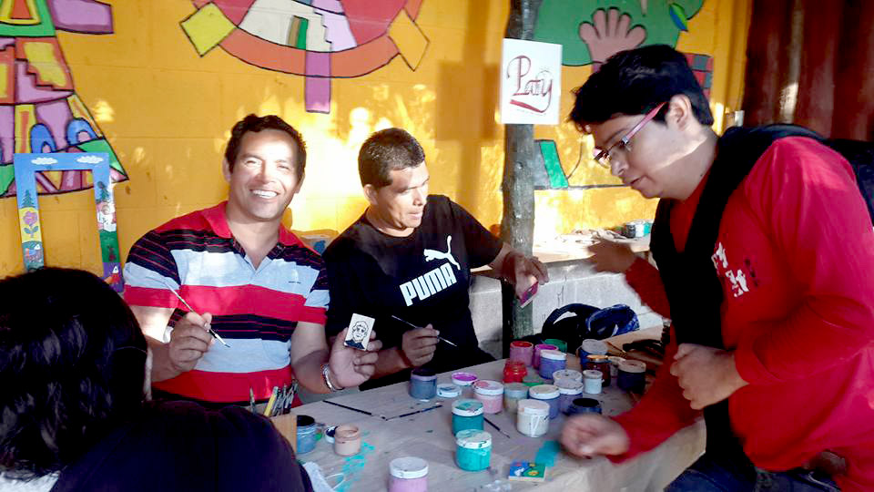 Customers enjoying a painting class
